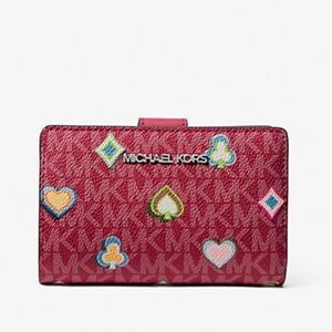 MICHAEL KORS Jet Set Md Printed Signature Logo Bifold Wallet
Dark Raspberry 
NWT
